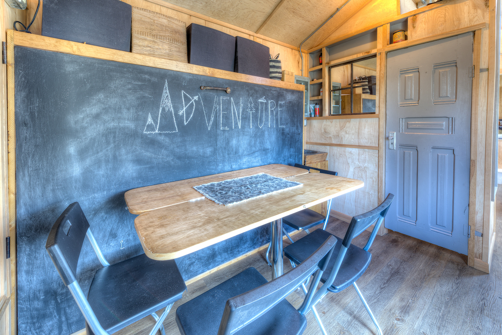 Lewis and Clarks Tiny House in Montana - Bed behind Table 2